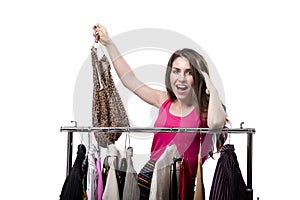 The woman choosing clothing in shop isolated on white