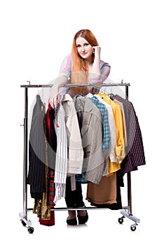 The woman choosing clothing in shop isolated on white