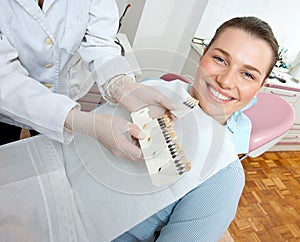 Woman choosing denture photo