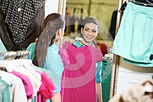 Woman shopping clothng photo