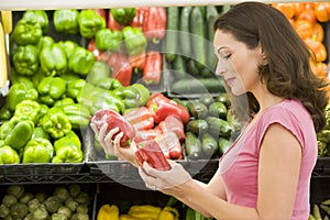 Woman choosing fresh produce