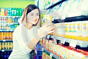 Woman choosing healthy baby food