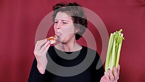 Woman choosing healthy or unhealthy food. Diet weight loss healthcare concept. Girl making a choice between pizza and