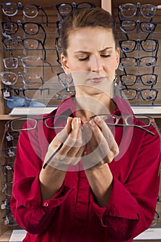 Woman Choosing Prescription Eye Glasses