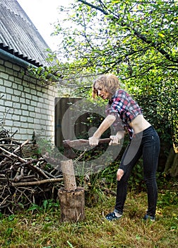 Woman Chopping Wood