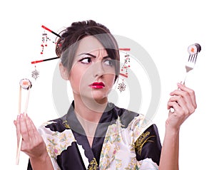 Woman with chopsticks, fork and