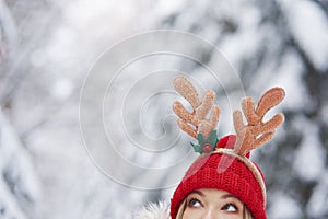 Woman in Christmas costume peeking