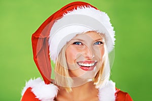 Woman, Christmas hat and celebration in studio for season holiday, vacation happiness or fun fashion. Female person