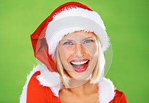 Woman, Christmas hat and celebration in studio for season holiday, vacation happiness or fun fashion. Female person