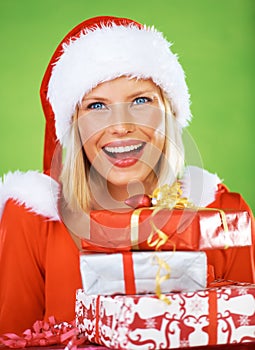 Woman, Christmas and outfit for gift box in studio for celebration, happiness or festive season giving. Female person