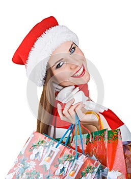 Woman in Christmas outfit with shopping bags