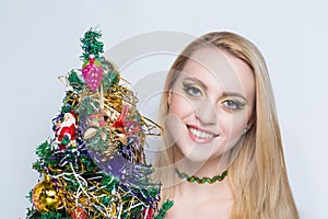 Woman with christmas tree