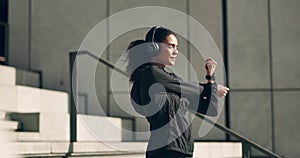 Woman on city stairs for exercise, stretching with headphones in muscle workout and morning body training. Urban fitness