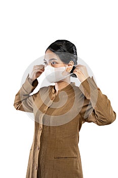 Woman in civil servant uniform wearing mask for health security