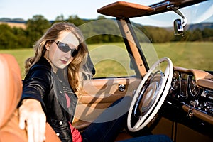 Woman and classic car