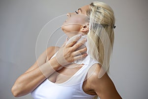 Woman clean neck with wet wipes