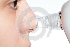 Woman clean nose from blackheads
