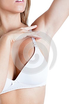 Woman with clean-shaven armpit photo