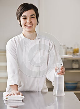 Woman Cleaning Counter