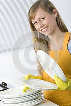 Woman Cleaning Dishes