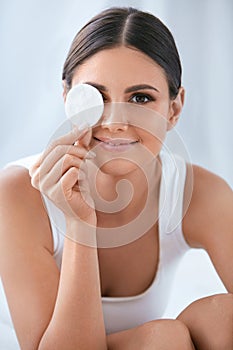 Woman Cleaning Face With Cosmetic Cotton Pad, Removing Makeup