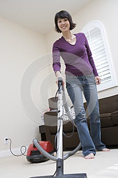 Woman Cleaning Floor At Home