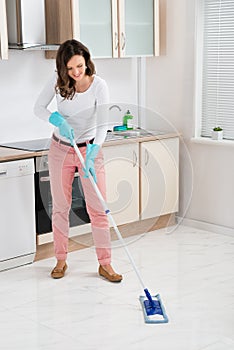 Woman Cleaning Floor With Mop