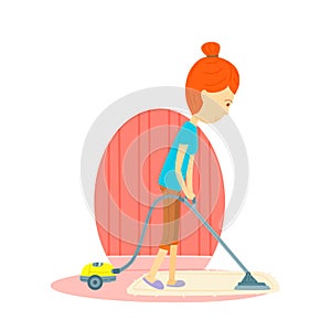 Woman is cleaning the floor with a vacuum cleaner