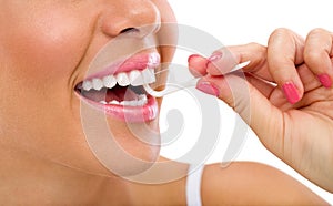 Woman cleaning flossing