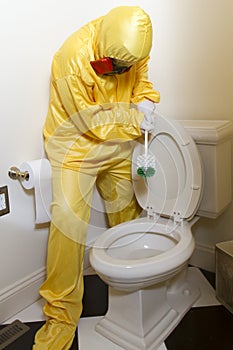 Woman cleaning Haz Mat toilet photo