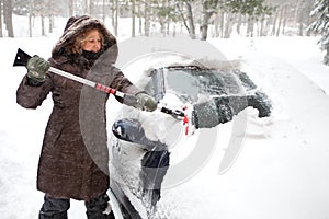 Woman cleaning her car