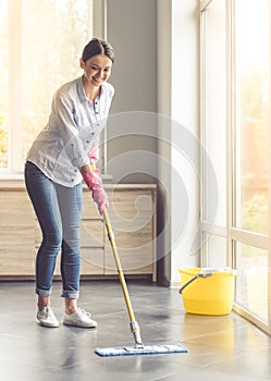 Woman cleaning her house