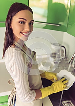 Woman cleaning her kitchen