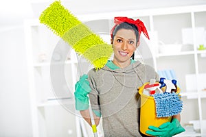 Woman with cleaning supplies