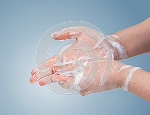 Woman is cleaning and washing her hands. Hygiene concept.