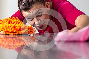 Woman cleaning a worktop