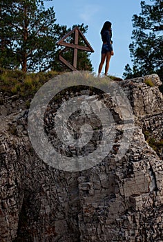 Woman on cliff