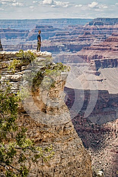 Woman on Cliff Edge in the Grand Canyon