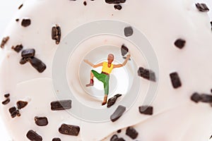 Woman climbing a donut