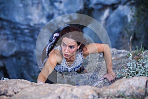 A woman is climbing in Turkey, Overcoming the fear of heights, Climbing effort