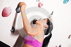 Woman at the climbing wall