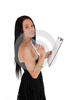 Woman with a clipboard taking invertor