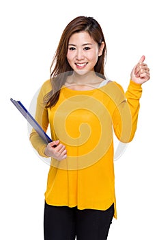 Woman with clipboard and thumb up