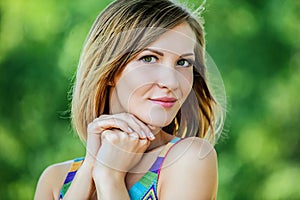 Woman close-up in orange sweater