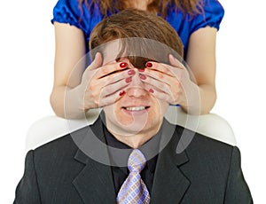 Woman closed to man of eye by means of hands