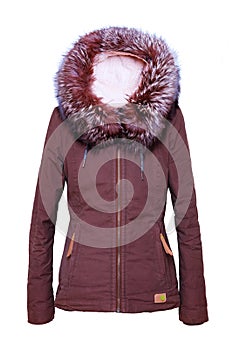 Woman clothes. Stylish brown female winter jacket with fur hood on mannequin isolated on a white background. Girls winter fashion