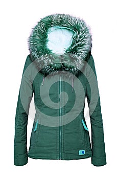 Woman clothes. Stylish green female winter jacket with fur hood on mannequin isolated on a white background. Girls winter fashion