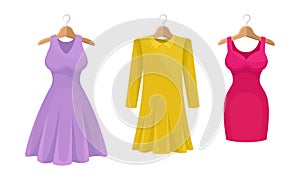 Woman Clothing with Long Sleeved Dress on Wooden Hanger Vector Set