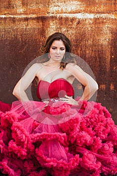 Woman in cloudy red dress, rustic style