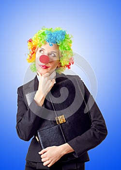 Woman clown in business suit